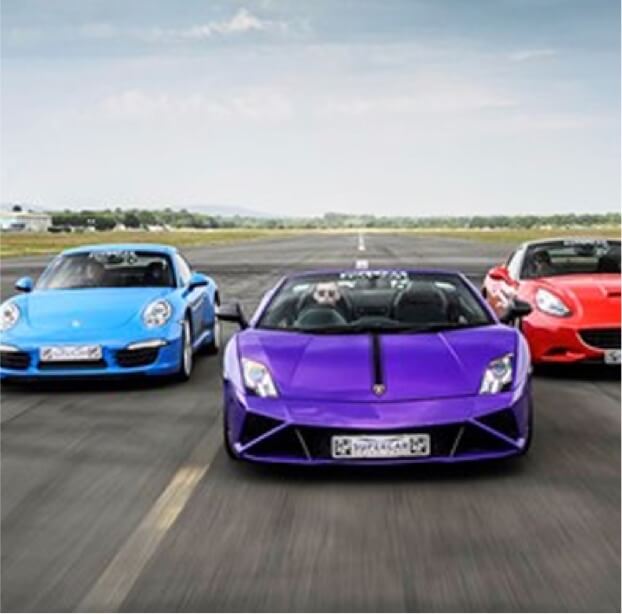 Fast and bright coloured supercars in a row